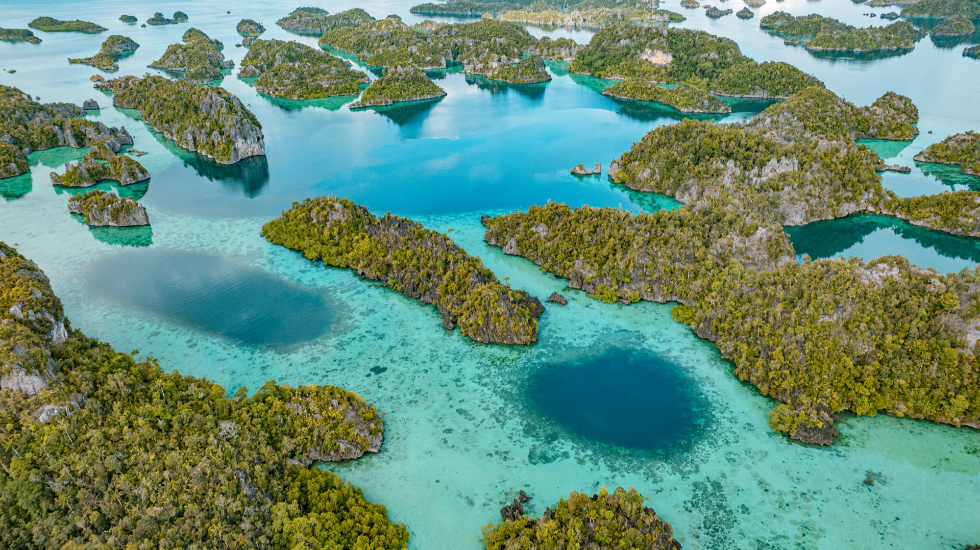 Aerial view of Raja Ampat's pristine islands and turquoise waters